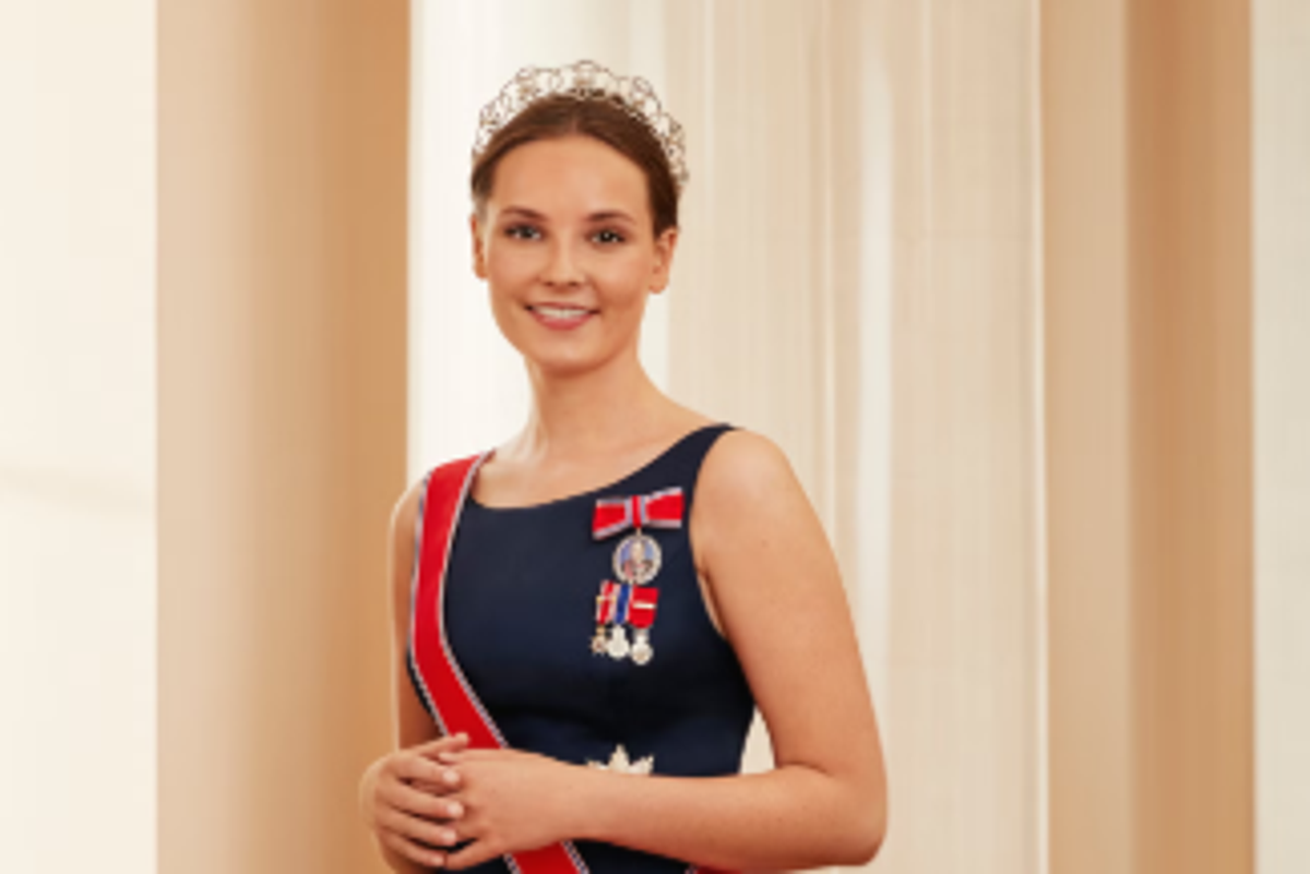A photo of a young woman, believed to be the future queen, walking in a park in Australia, with a subtle hint of security personnel in the background, highlighting the importance of royal protection and safety measures