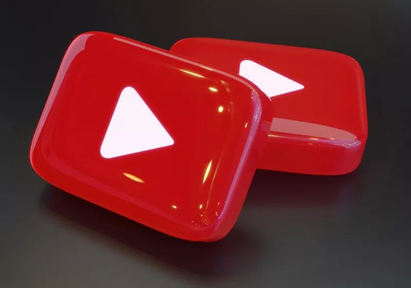 A person searching for health information online, with a YouTube video playing in the background, highlighting the dominance of YouTube in Google's AI health summaries.