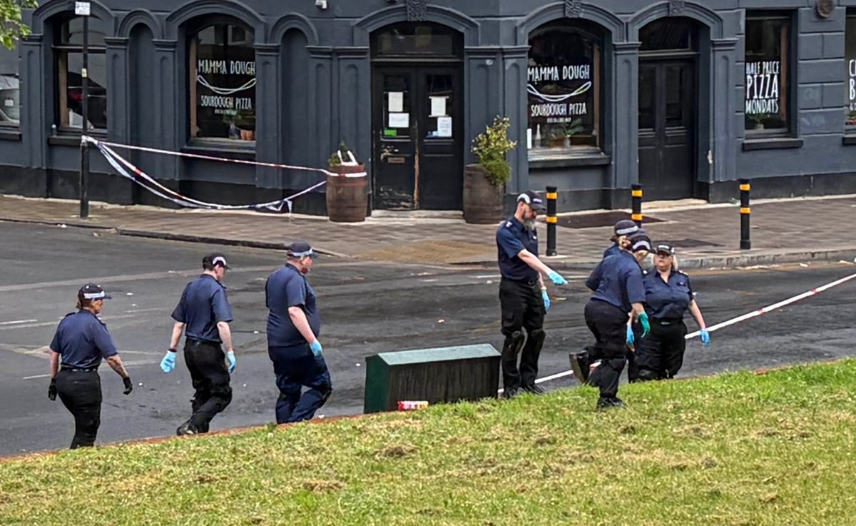 A descriptive image of a London street with a police cordon, highlighting the need for community safety and effective crime prevention strategies in the wake of the Brixton shooting