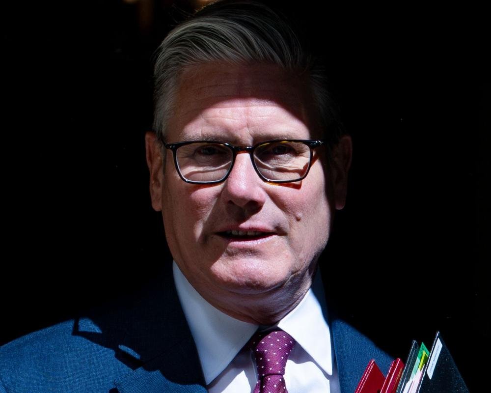 A group of Labour MPs gathered around a table, engaged in a heated discussion about the party's future, with a mix of concerned and determined expressions, as they navigate the complexities of leadership speculation and the colour of their party's policies