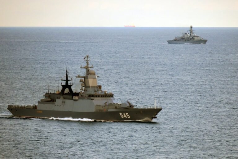 The HMS Iron Duke, a Type 23 frigate, sailing through choppy waters, its primary keyword being Royal Navy, with the UK's naval capabilities and defence strategy being analysed and scrutinised