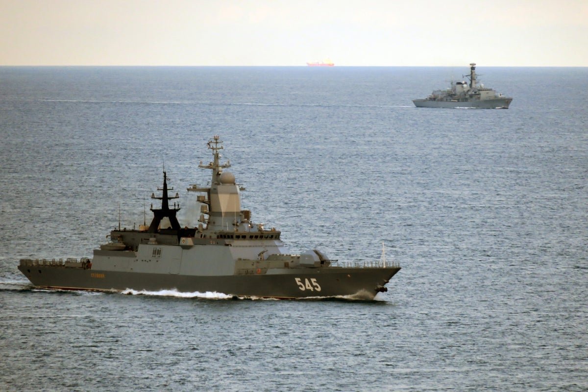 The HMS Iron Duke, a Type 23 frigate, sailing through choppy waters, its primary keyword being Royal Navy, with the UK's naval capabilities and defence strategy being analysed and scrutinised