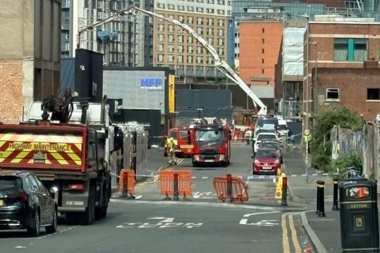 A stolen car rams into the shutters of a Birmingham Jaguar showroom, sparking a fire and causing significant damage to the property, with a focus on the Birmingham Jaguar showroom