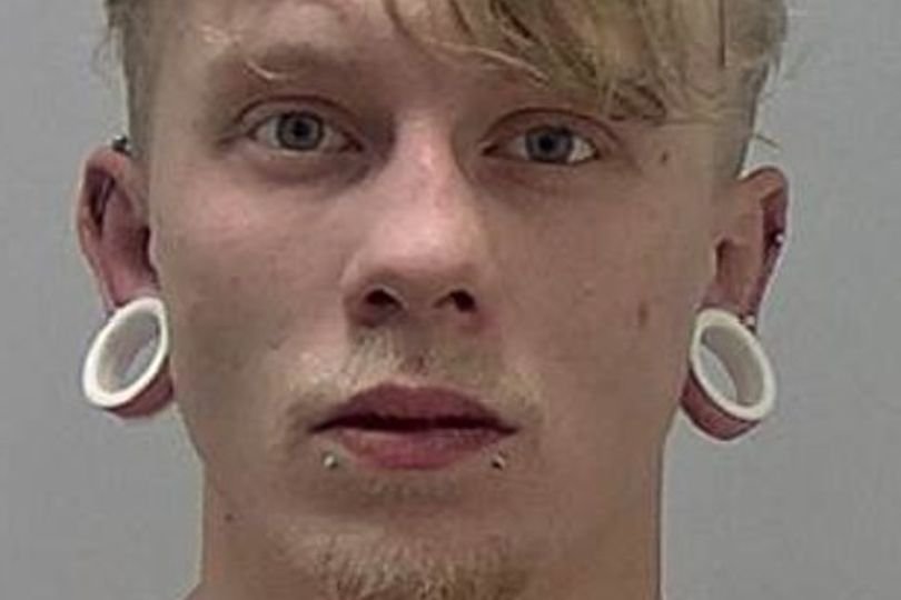 A man with a distinctive 'already dead inside' tattoo is being sought by police in connection with a serious attack in Birmingham, a city in the West Midlands region of England, known for its rich history and cultural heritage, with the police investigation ongoing and the community remaining on high alert