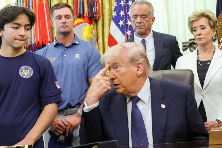 Donald Trump speaking in the Oval Office, surrounded by children, with a serious expression, as he describes the horrors of the Iran war, with the American flag in the background, symbolizing the geopolitical situation and international relations