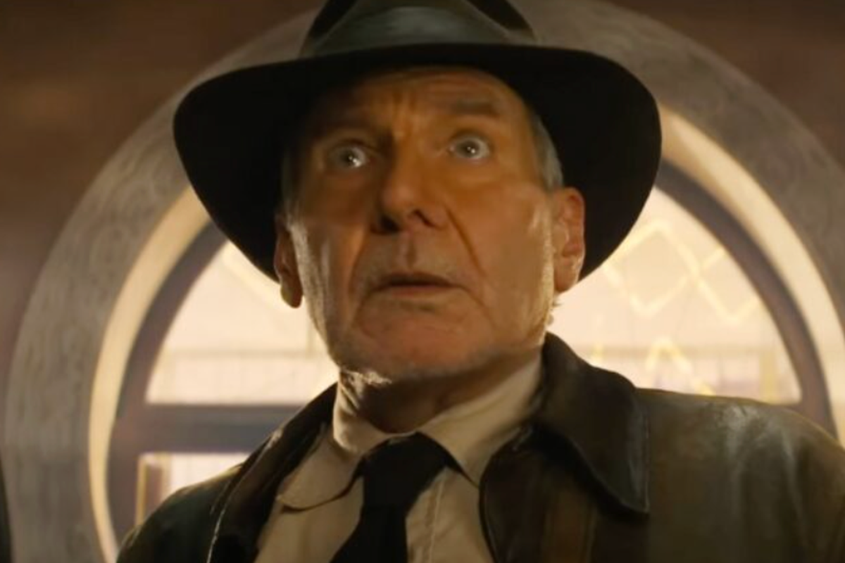 Indiana Jones and Steven Spielberg on set, discussing the film's script and production, with a focus on the primary keyword, Indiana Jones, and the movie's divisive nature, sparking intense debate among fans and critics, with the film's reception being a subject of interest for many film enthusiasts