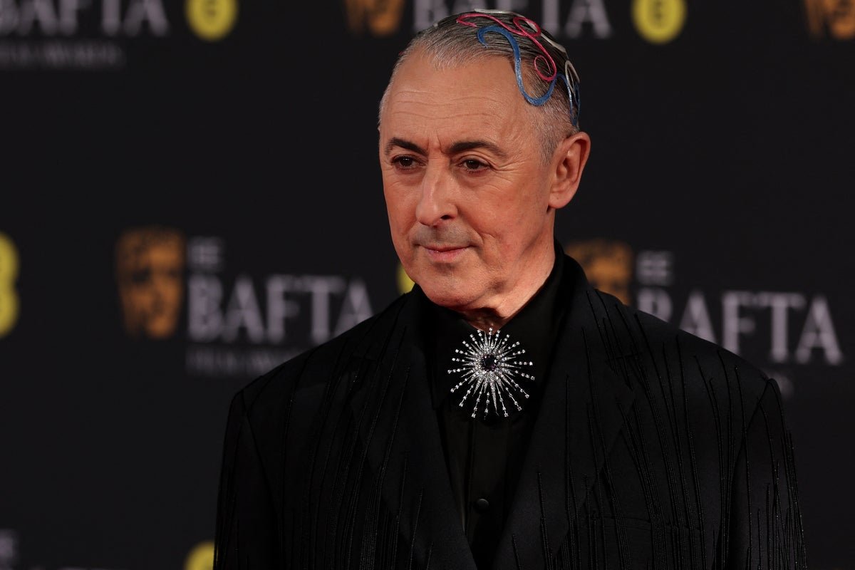 Alan Cumming speaking out against BAFTA, highlighting the importance of good leadership and disability awareness, with a focus on Tourette's syndrome and inclusive behaviour