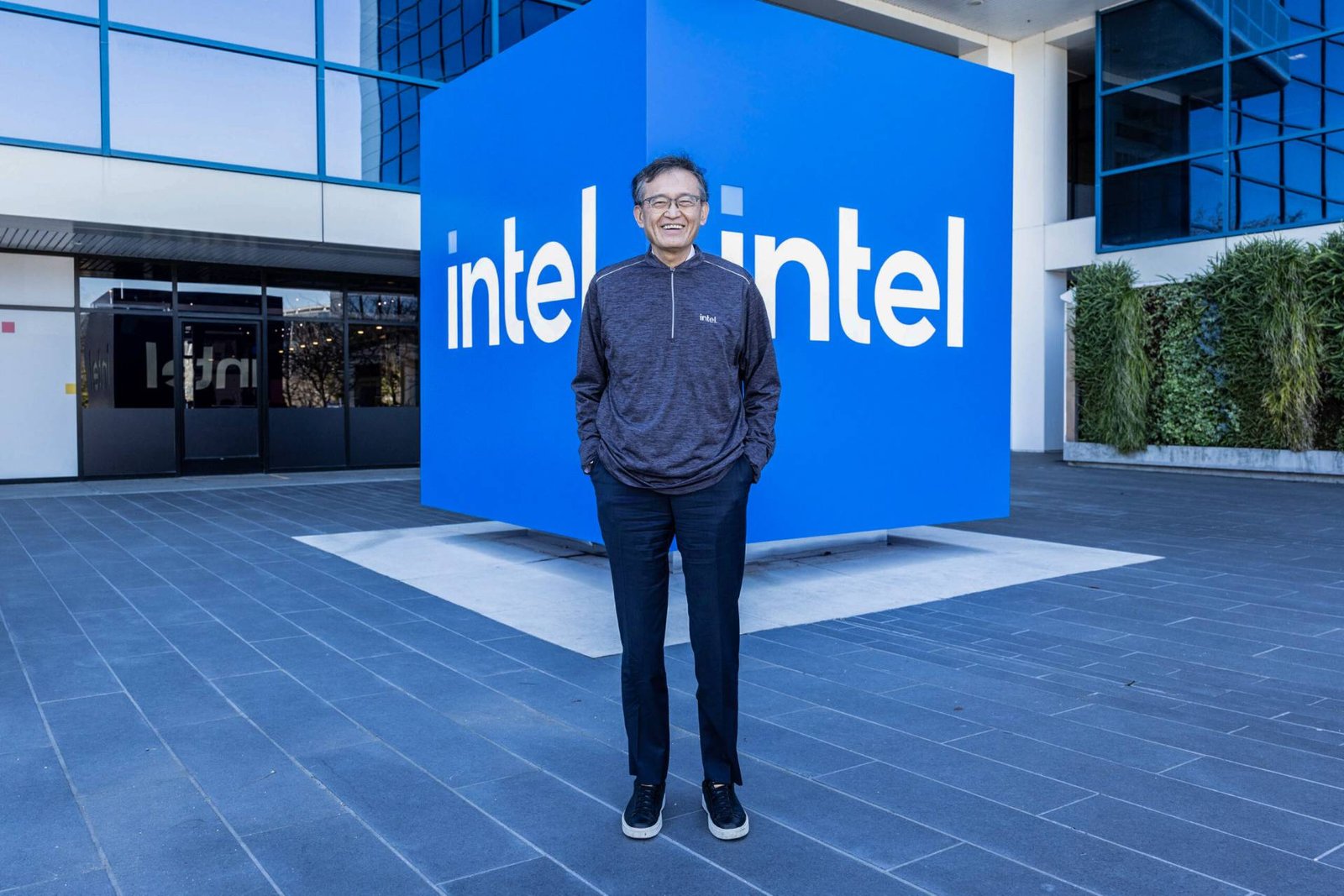 Intel's CEO Lip-Bu Tan speaking at a UK tech event, highlighting the company's commitment to innovation and customer satisfaction in the UK market, with a focus on Leadership Through Execution