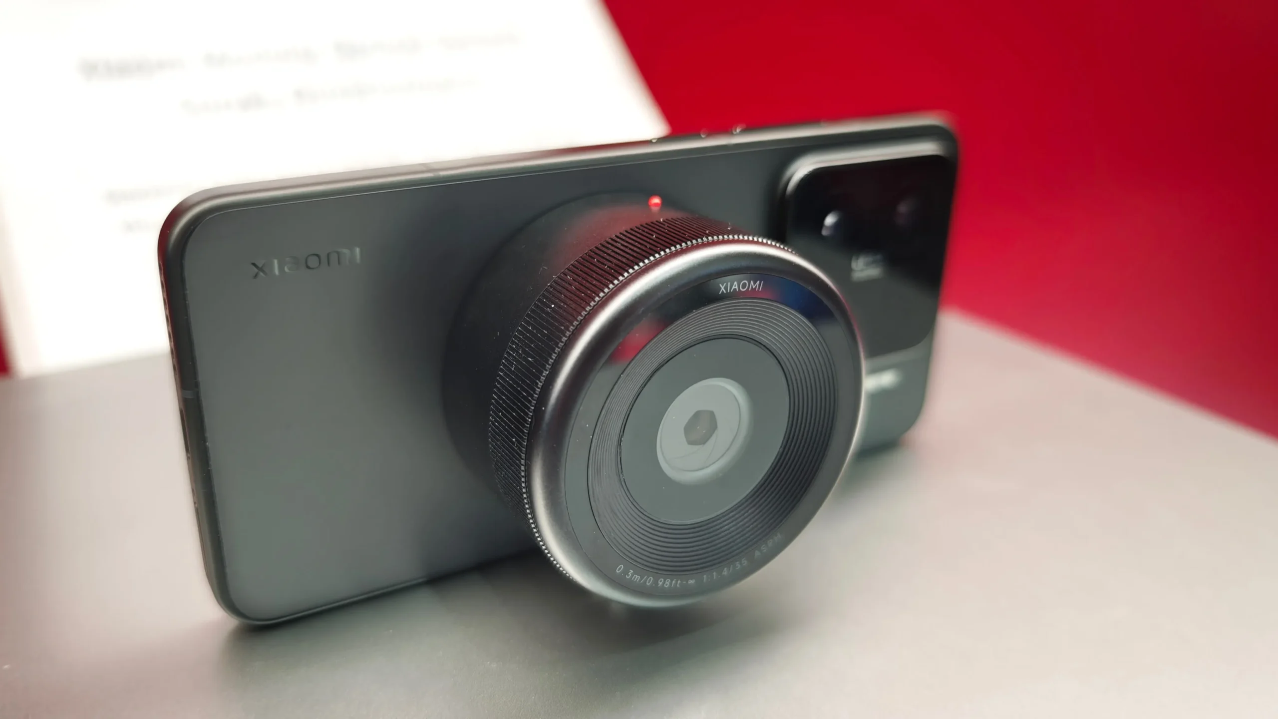 Xiaomi's modular camera lens concept features a sleek and seamless design, with a Fusion X Sensor and variable aperture, making it a game-changer in mobile photography