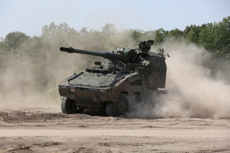The British Army is introducing remote-controlled guns as part of a £1bn deal, featuring a soldier operating a remote-controlled gun in a combat scenario, with a focus on the latest military technology and defence innovation, highlighting the army's commitment to embracing cutting-edge equipment and reducing the risk of casualties