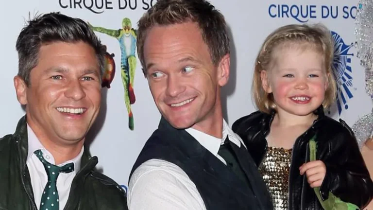 Neil Patrick Harris' teen daughter attends a high-profile event with her dads, showcasing her elegant and trendy outfit, a perfect blend of colour and style, with her primary keyword being celebrity kids