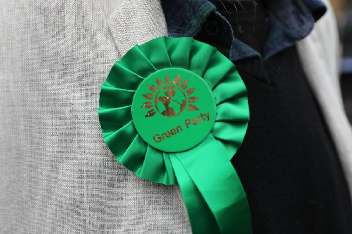 A photo of the London council building with a caption describing the recent resignations of Green Party councillors and the financial implications for the council, including the £100,000 bill for by-elections, with a focus on the primary keyword phrase London council financial strain