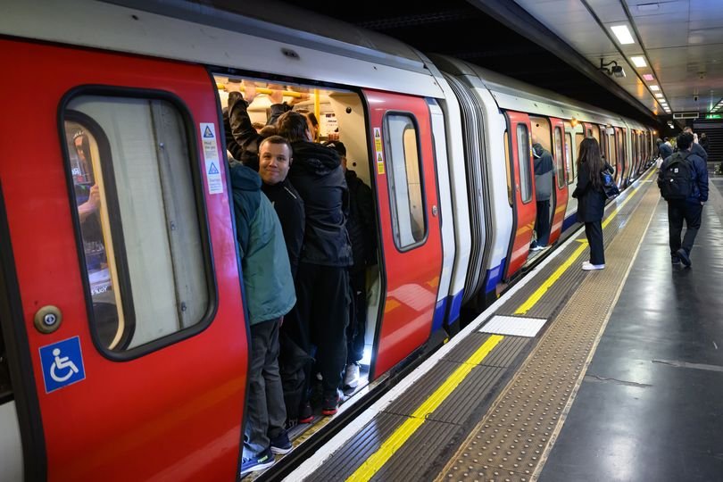 London tube strikes May 2026: a deserted tube station, with a sign reading 'tube strikes' and commuters waiting outside, with the London transport logo in the background, highlighting the impact of industrial action on the city's transport network