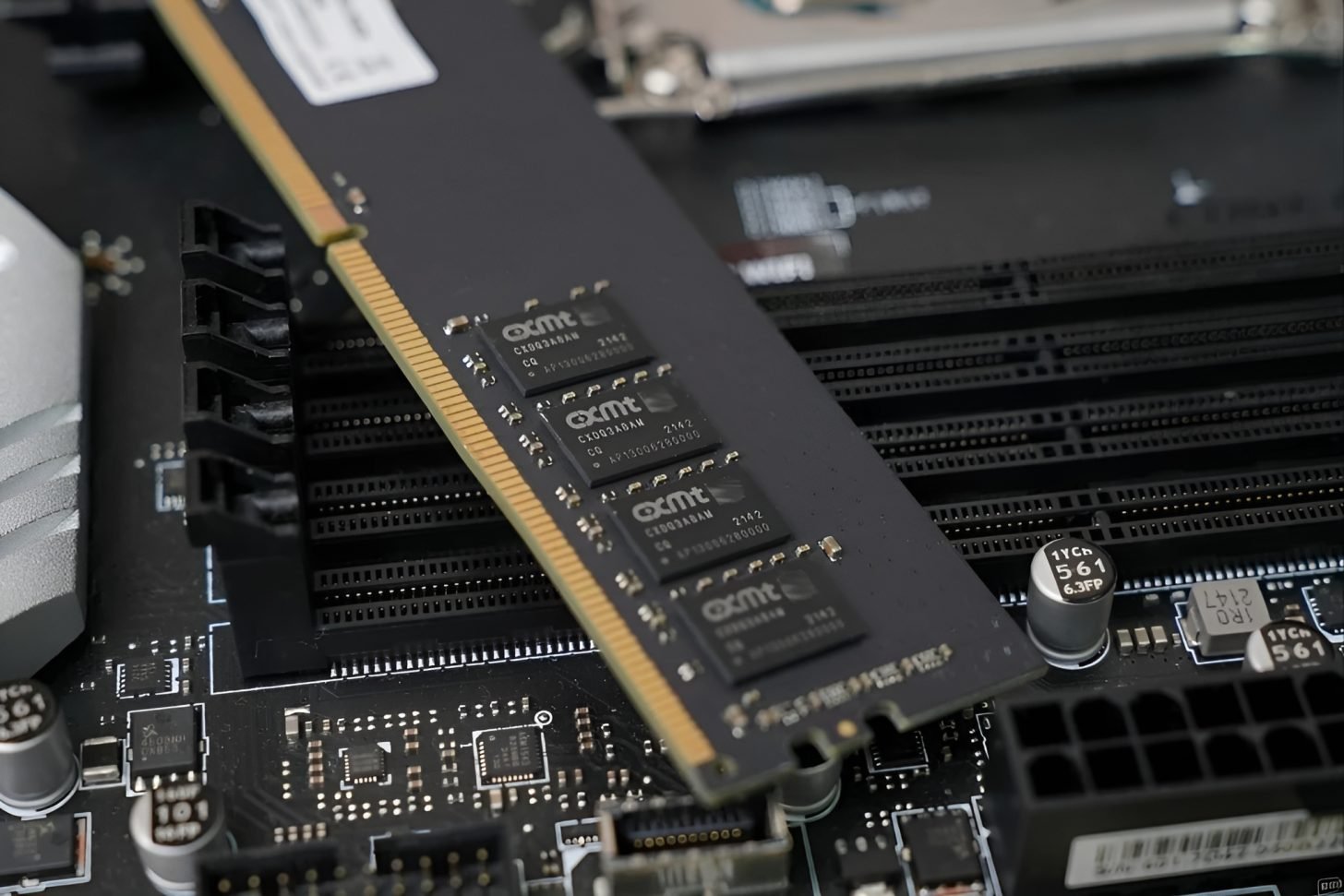 China's memory chip production line, with rows of machinery and workers in the background, highlighting the country's growing presence in the global memory chip market and its potential to disrupt the industry and tackle the current 414% DDR5 price spike