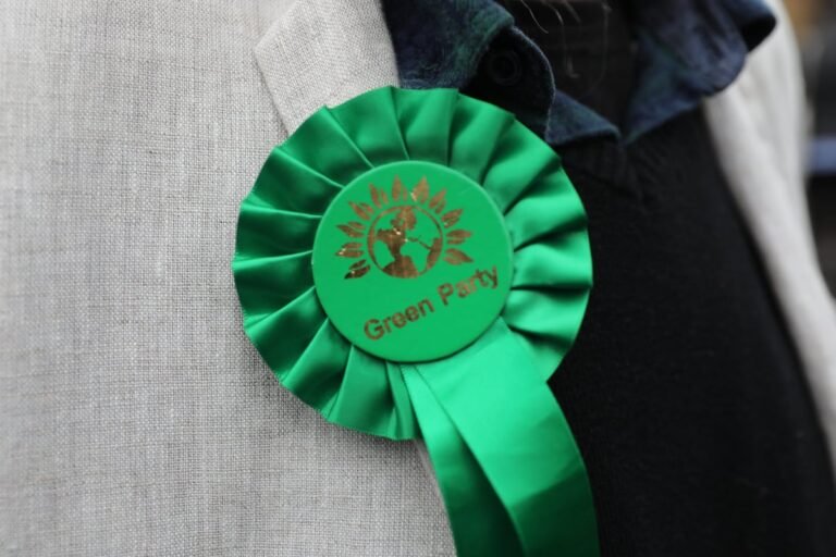 A photo of the London city skyline with a caption describing the financial implications of the Green councillor resignations, including the £120,000 bill for by-elections, which will be a significant burden on taxpayers and a challenge for the Green Party to regain public trust