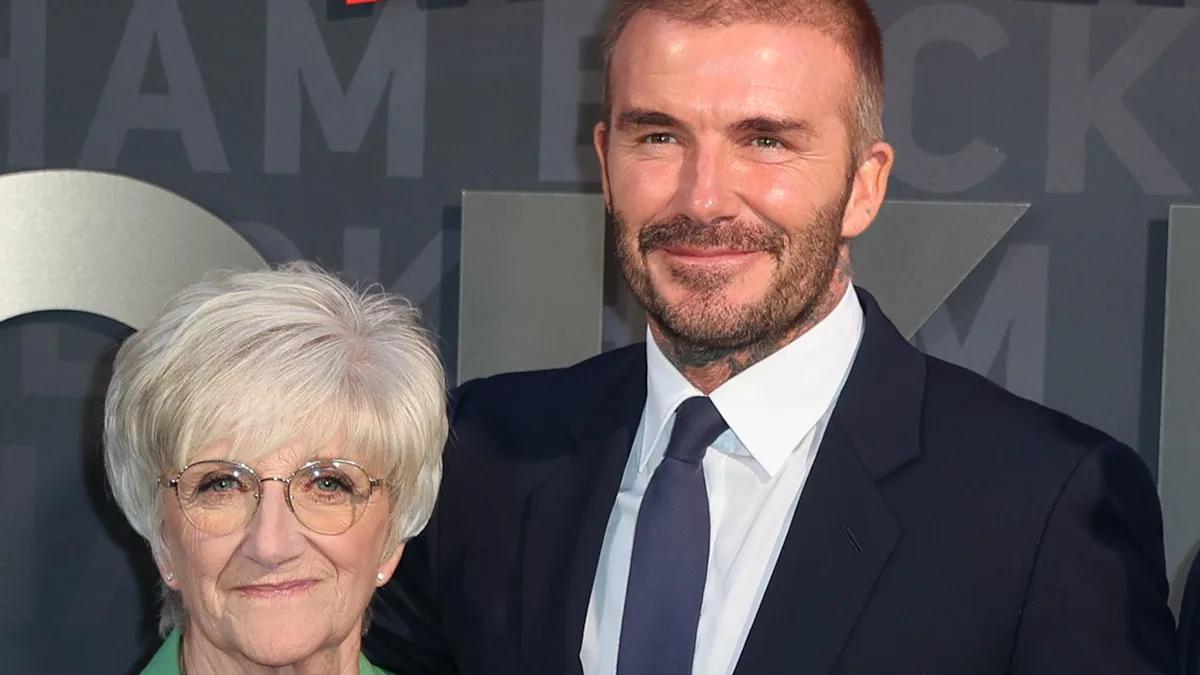 David Beckham shares a family update on social media, featuring his mum Sandra and sister Joanne, amidst a scandal involving his son Brooklyn, showcasing the importance of family and togetherness in difficult times, with a warm and colourful photo of the family together