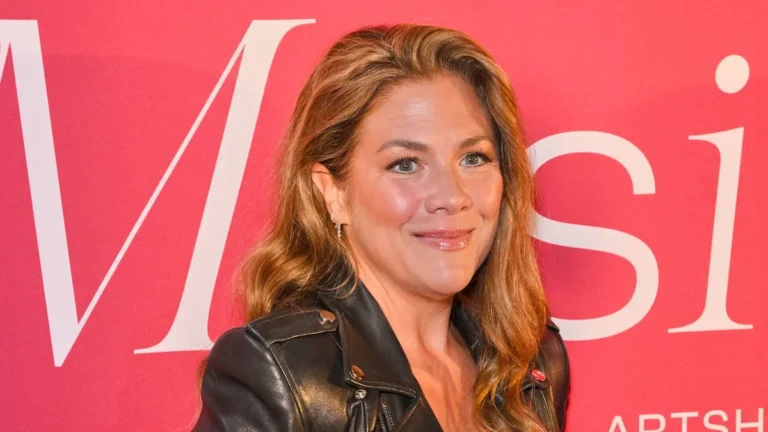 A sombre and reflective image of a person sitting alone on Valentine's Day, surrounded by reminders of love and relationships, with a subtle hint of the Canadian flag in the background, symbolising Justin Trudeau's presence in the story