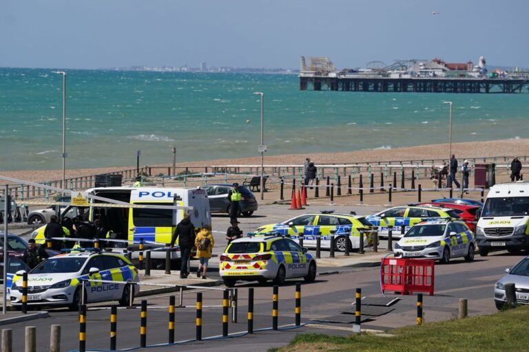 A sombre and reflective image of the Brighton coastline, with a focus on the sea and its potential dangers, highlighting the importance of water safety and awareness in preventing tragic incidents