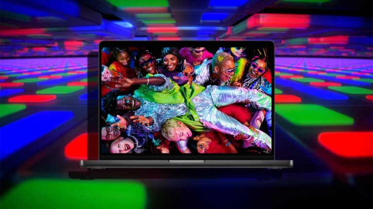 Featured image of the M6 MacBook Pro with OLED display, showcasing vibrant colours and contrast, with the UK flag in the background, representing the device's launch in the UK market, with a focus on the primary keyword, M6 MacBook Pro