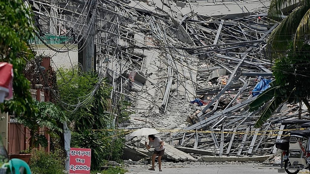 Rescue efforts underway after the collapse of an unfinished hotel in the Philippines, with emergency services working to locate those still missing, in a tragic incident that has raised concerns about construction safety and regulations in the country