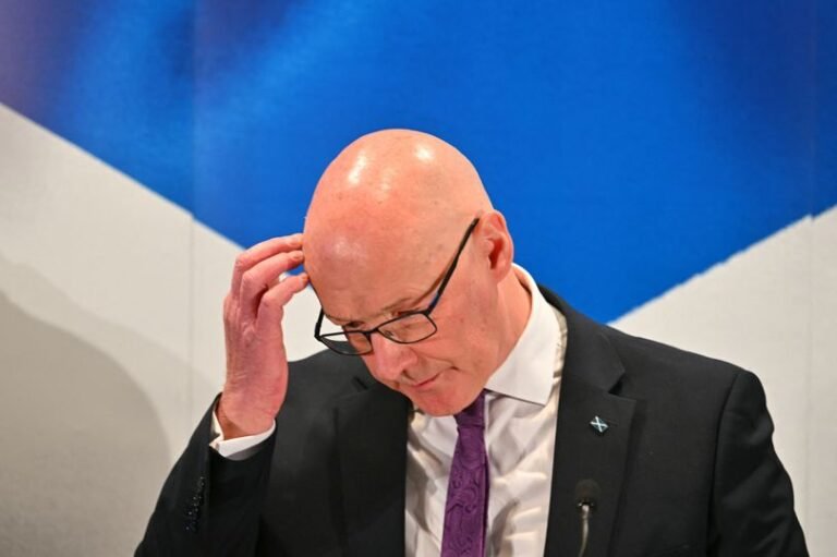 A descriptive image of the Scottish and UK flags, symbolising the ongoing debate over Scottish independence, with a subtle colour palette reflecting the uncertainty of the situation