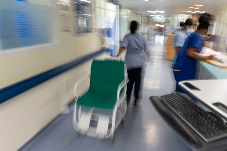 A descriptive image of a nurse in a hospital, with a red cross symbolising the NHS, highlighting the importance of patient safety and the need to address rogue nurses, with a focus on the primary keyword phrase 'rogue NHS nurses'