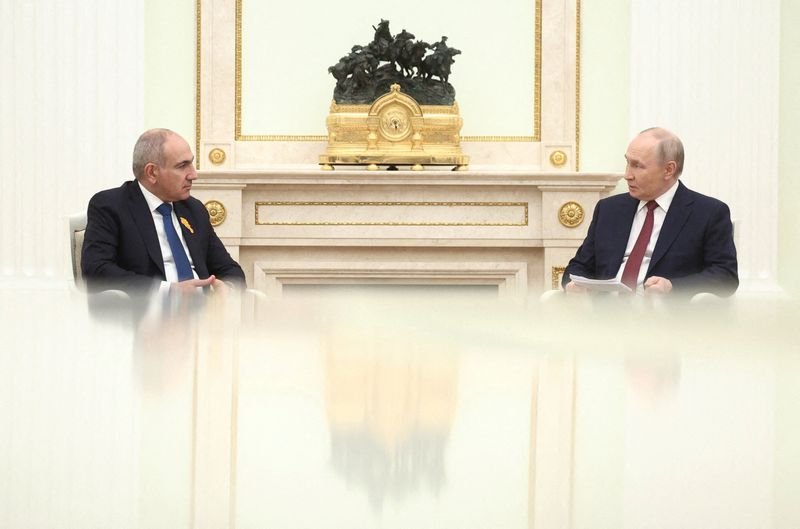 Armenian Prime Minister Nikol Pashinyan meeting with European Union officials to discuss the country's bid for membership, highlighting the complex geopolitics and Russia's influence in the region