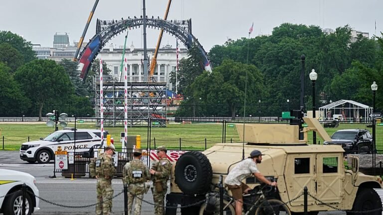 UFC fight venue outside White House for Trump birthday celebration, with a large crowd of spectators and a unique fighting arena