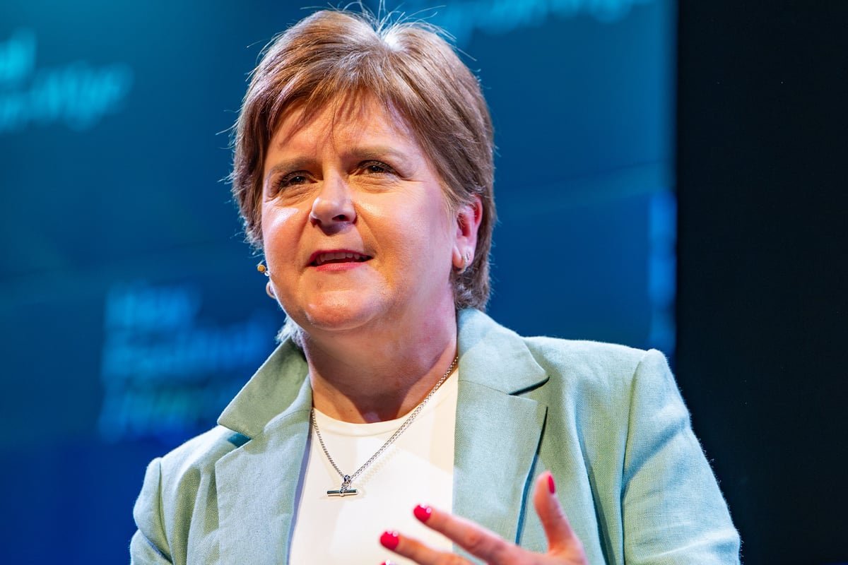 Nicola Sturgeon, the former First Minister of Scotland, pictured outside a London building, amidst controversy surrounding her husband's conviction, as she defends her record and navigates a new chapter in her life, with a mix of curiosity and scrutiny from the public and the media, in the heart of the UK's capital city, with a subtle blend of colour and emotion, as she embarks on a new journey, with a determined look on her face, and a sense of purpose in her eyes.