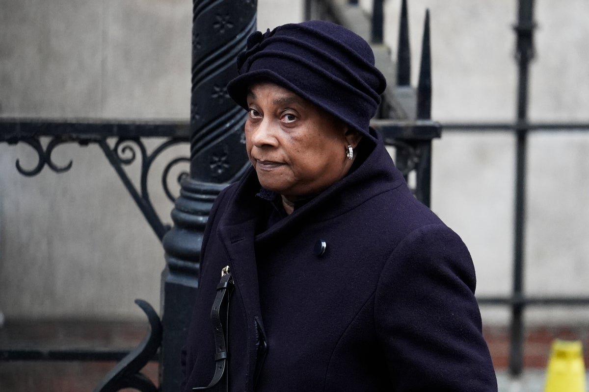 Doreen Lawrence, mother of Stephen Lawrence, speaking out against racial violence and discrimination, with a determined look on her face, highlighting the importance of justice and equality in the UK