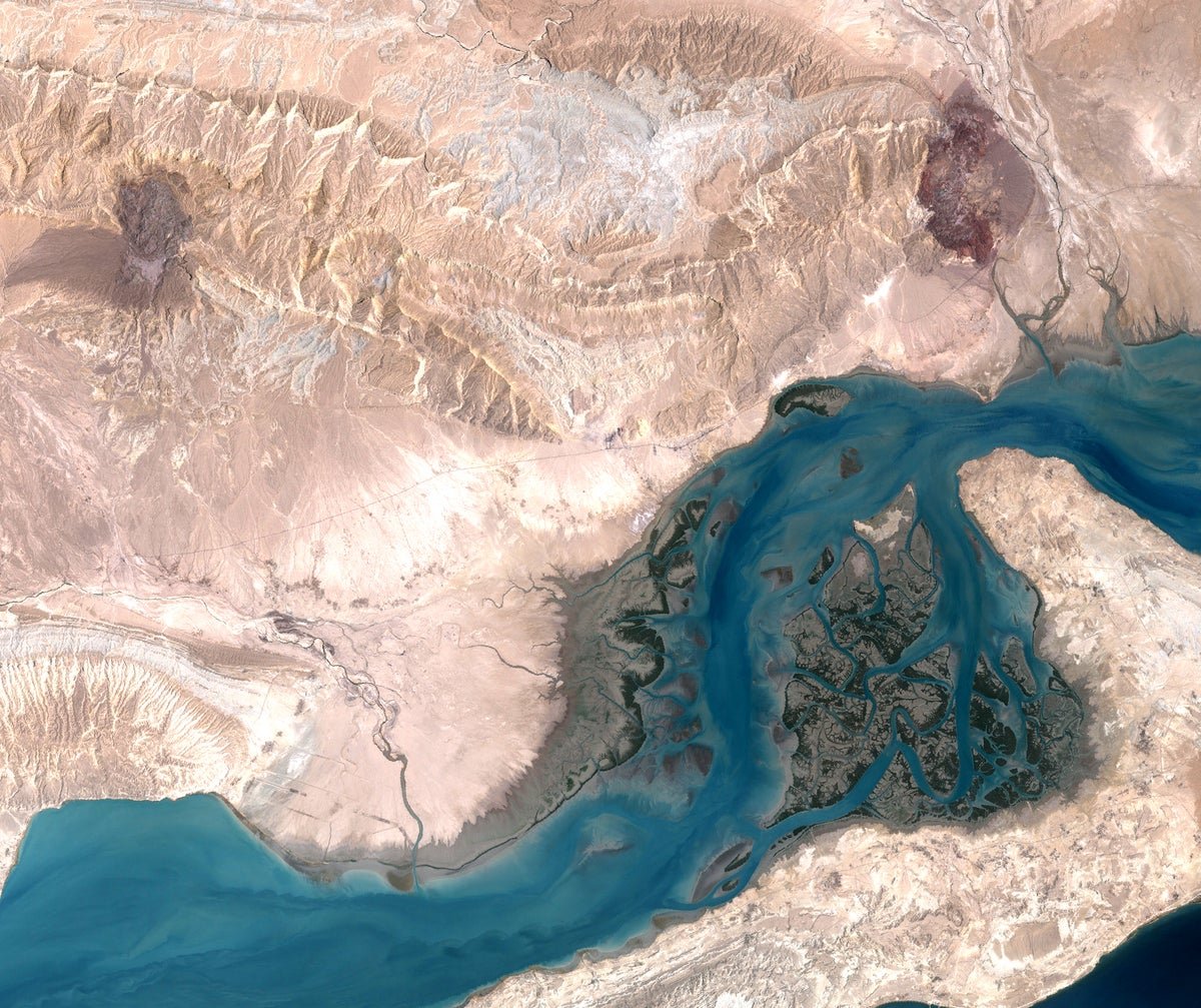 Aerial view of Qeshm Island, showcasing its unique geography and strategic location in the Middle East, with a focus on its underground missile city and military capabilities
