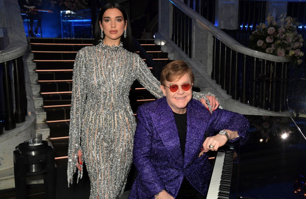 Dua Lipa and Callum Turner exchange vows at their second wedding, surrounded by close friends and family, with Elton John delivering a memorable performance, a perfect blend of love, music, and colour, on their special day