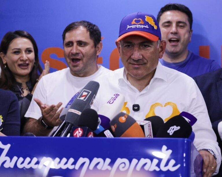 Armenia’s pro-Europe party wins election, marking a significant shift in the country’s political landscape and moving away from Russia, with the European flag waving in the background, symbolising the country’s new era of cooperation with Europe
