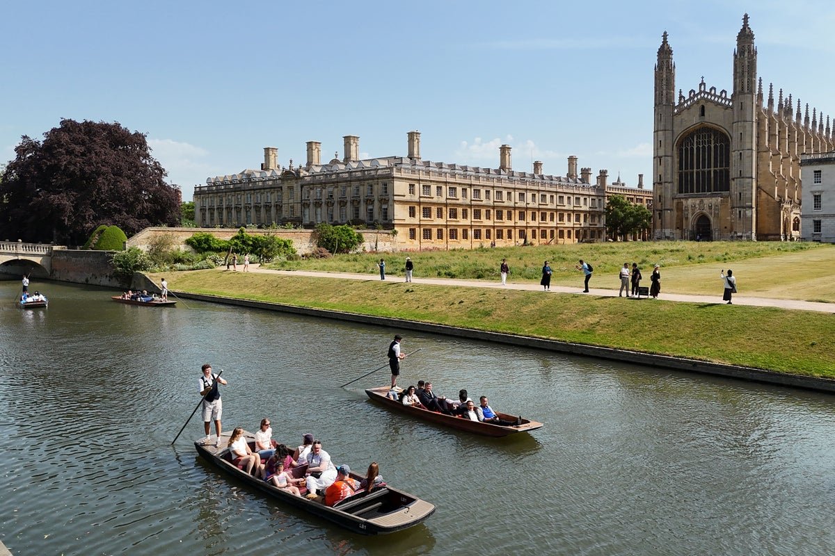 A descriptive image of a sunny day in the UK, with clear blue skies and warm temperatures, perfect for outdoor activities, with the primary keyword UK weather