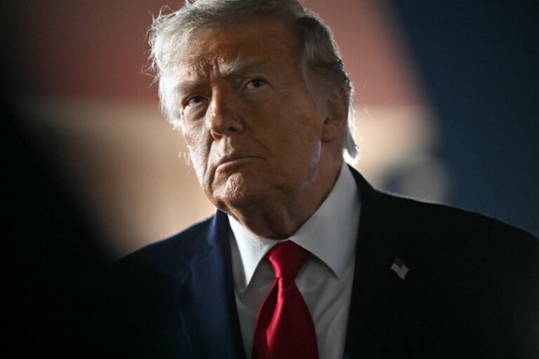 President Trump speaking at a press conference, with a serious expression, as the US and Iran teeter on the brink of conflict, with the primary keyword Iran strikes featured prominently
