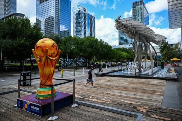 A descriptive image of a football stadium with a packed crowd, highlighting the excitement and passion of the World Cup, with the primary keyword 'World Cup' featured naturally
