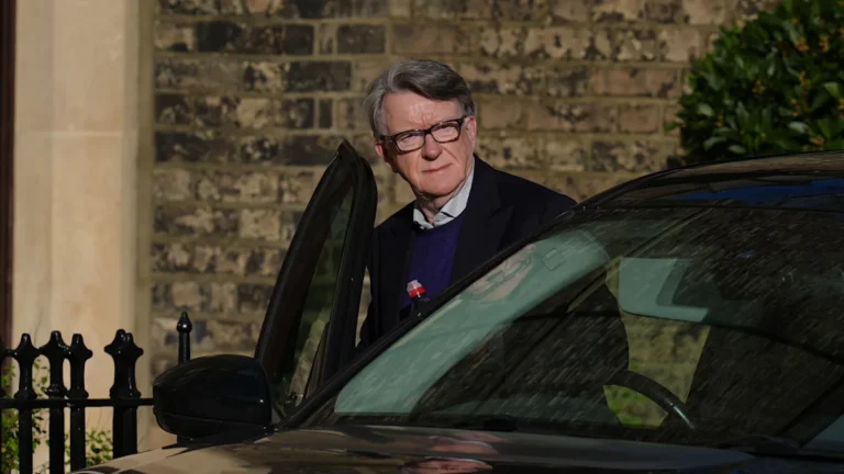 Lord Mandelson, the newly appointed US ambassador, poses for a photo, with the UK and US flags in the background, symbolising the special bond between the two nations, and the colour of the diplomatic world