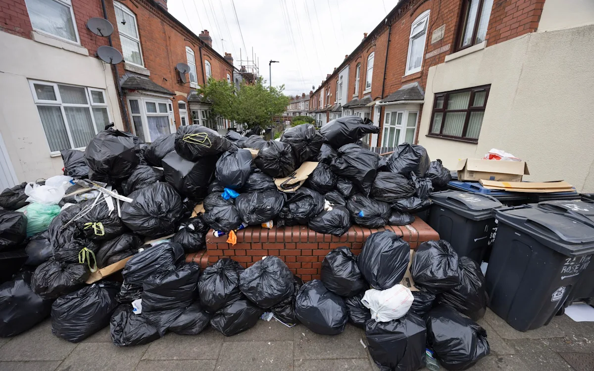 Labour councillors in a meeting, discussing financial management and bin strike, with a focus on transparency and accountability, and a primary keyword of financial mismanagement