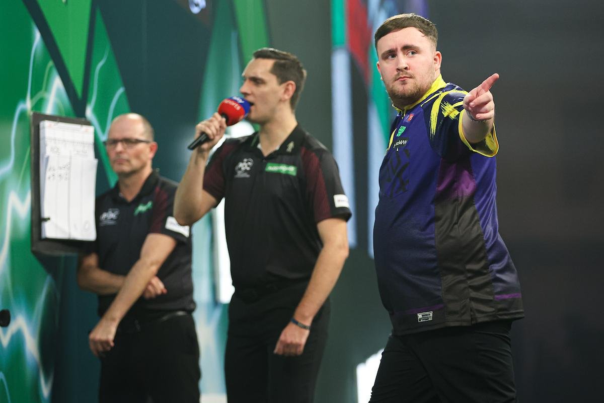 Luke Littler in action at the darts championship