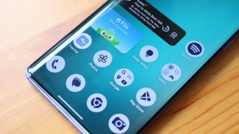 A person holding an Android phone with a lock screen, highlighting the importance of mobile data protection and Android privacy settings.