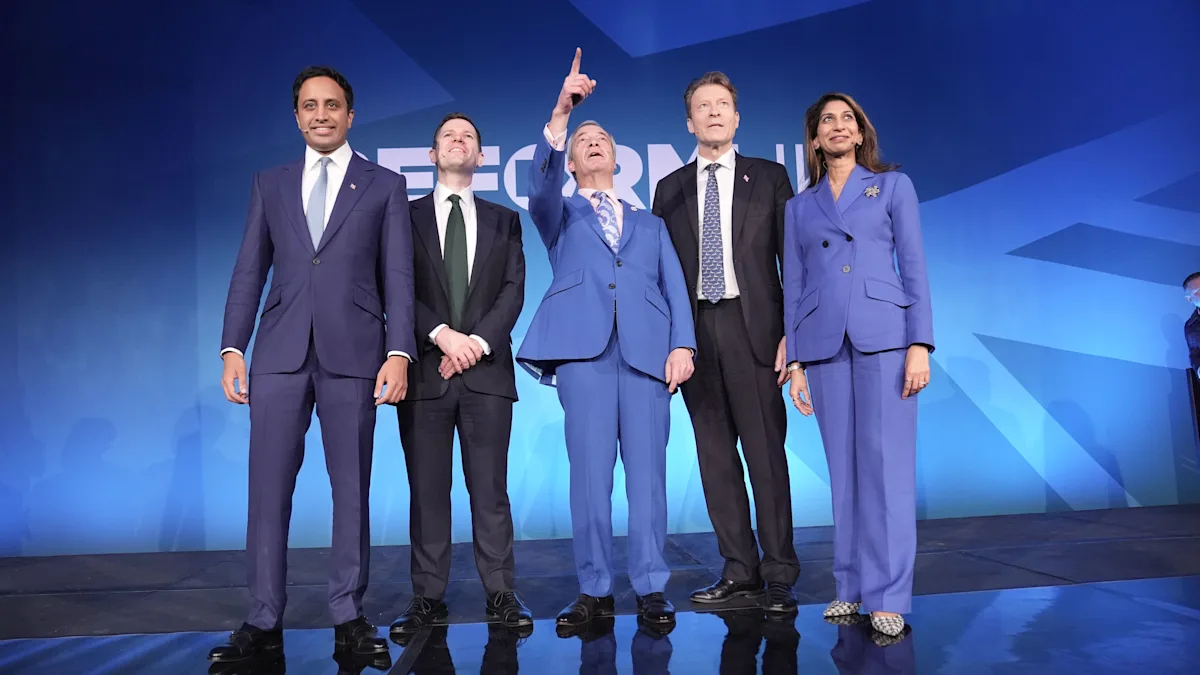 Nigel Farage stands alongside Jenrick and Braverman as they unveil the new Reform front bench, bringing a sense of change and reform to British politics, with a focus on shaping the party's behaviour and direction
