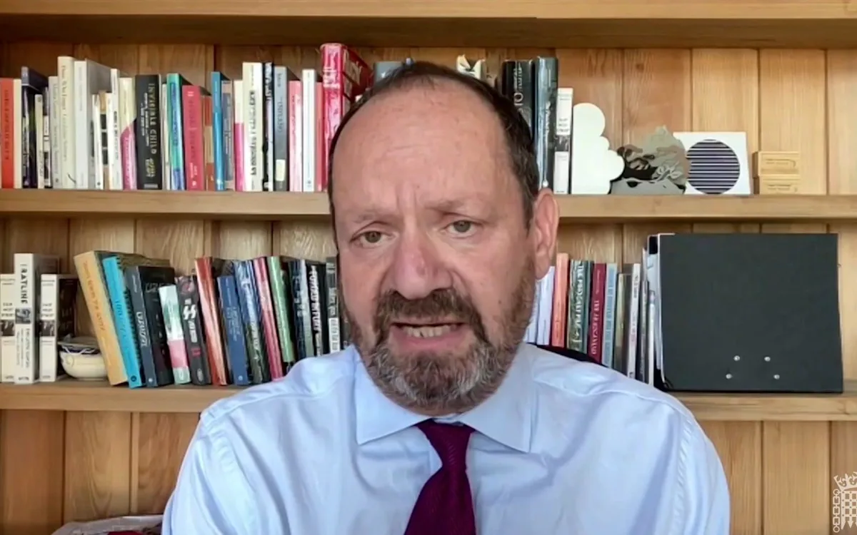 Aerial view of the Chagos Islands, with a focus on the natural beauty and the potential for economic development, highlighting the need for transparency in deals involving the islands