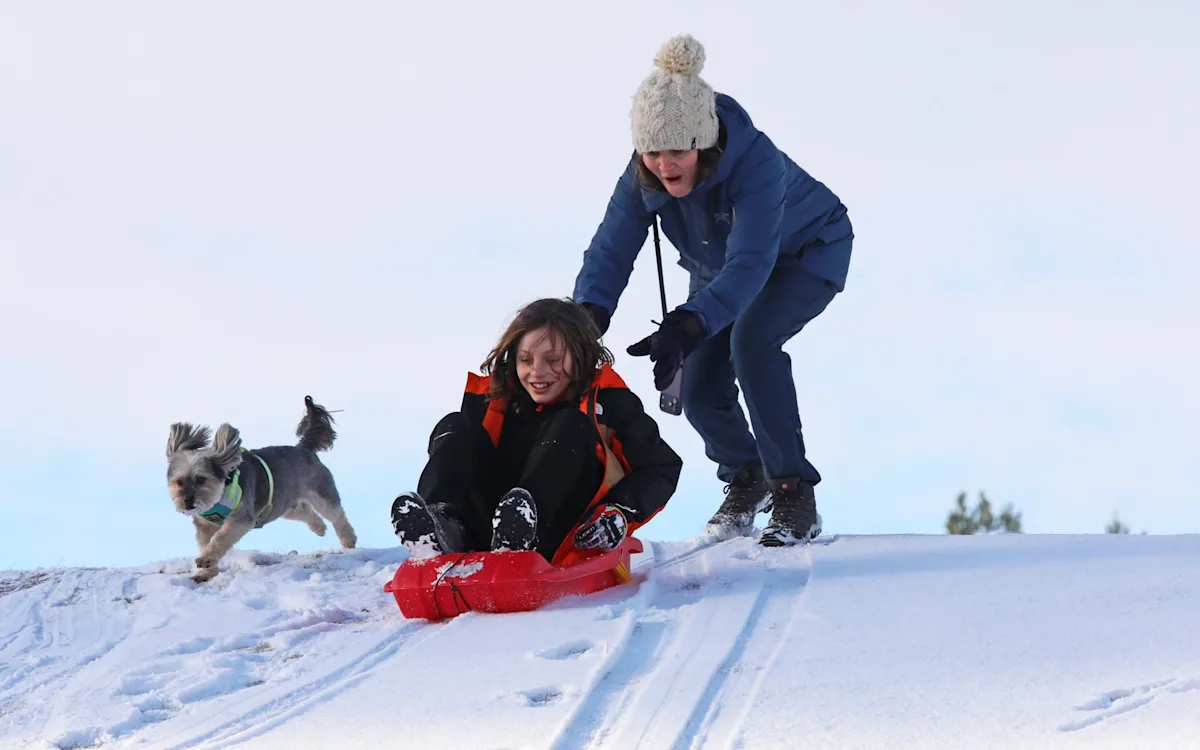 A photograph of a snowy landscape in Britain, with the caption Snowstorm Pedro is expected to bring significant snowfall and disruption to the region, prompting warnings from meteorologists and emergency services, with a focus on the winter storm