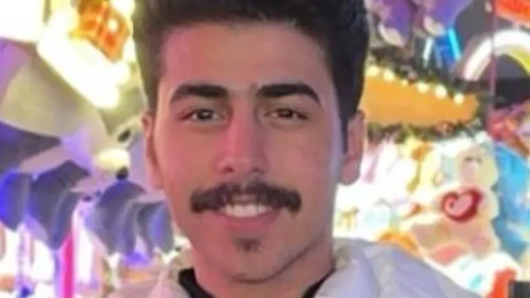 A descriptive image of a Saudi Arabian student, with a focus on the CCTV footage of the stabbing incident, highlighting the importance of security measures and community support, with a colour palette of concern and solidarity