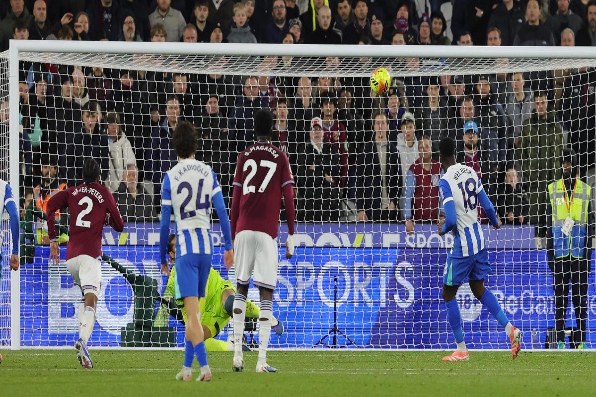 Brighton player taking penalty kick