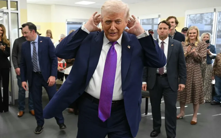 A descriptive image of a UFO flying over a city, with a subtle hint of a question mark in the background, symbolising the mystery and intrigue surrounding alien existence, a topic that has been at the forefront of human curiosity for centuries, with many searching for answers about the possibility of life beyond our planet