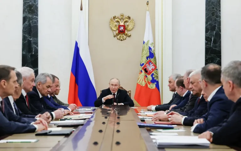 A descriptive image of a person trying to access the internet, with a red cross over it, symbolising internet censorship, with a focus on Putin's latest move to grant spies control over internet access in Russia